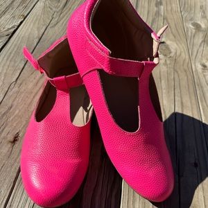 Beautiful neon pink woman’s T-strap shoes!